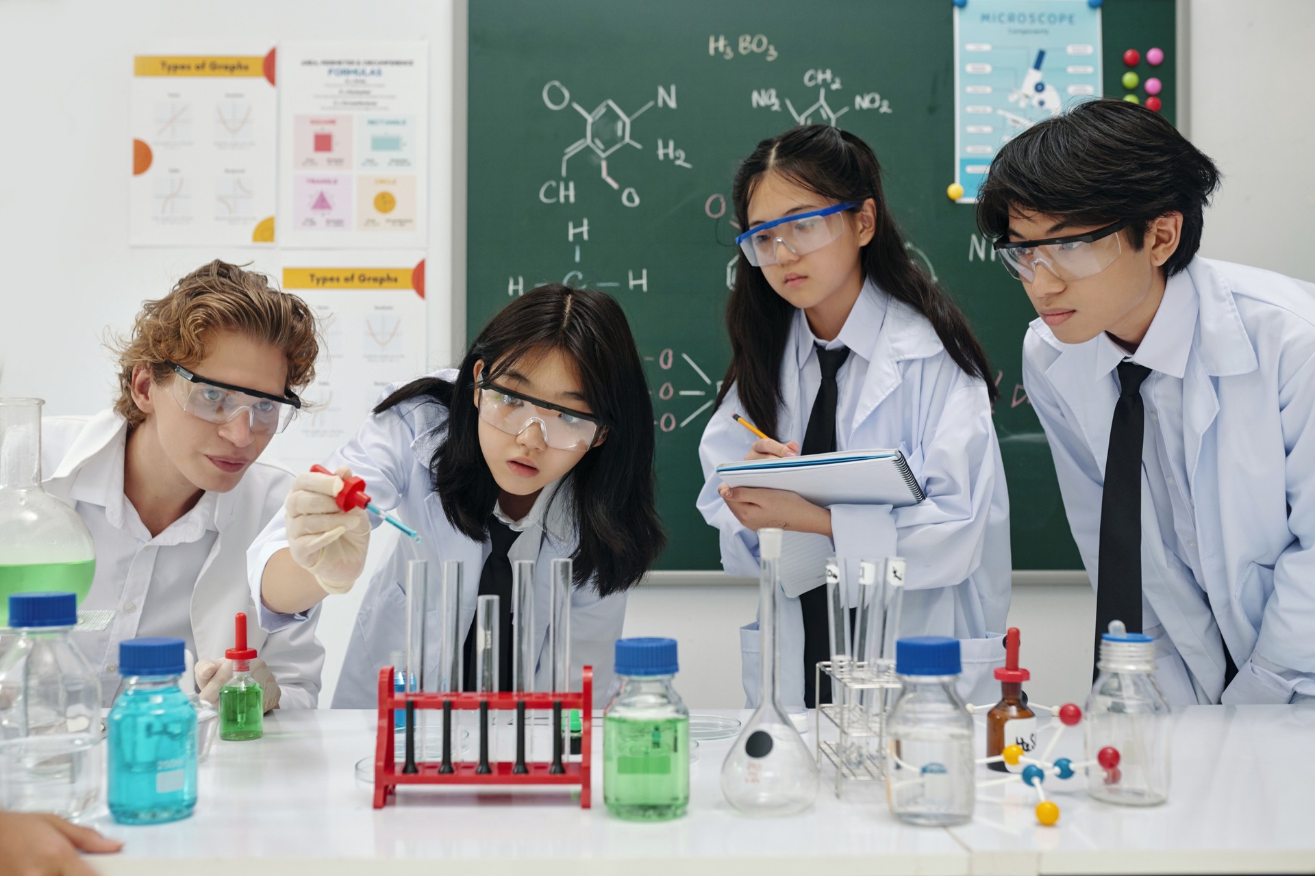 Conducting Science Experiment in Laboratory with Students