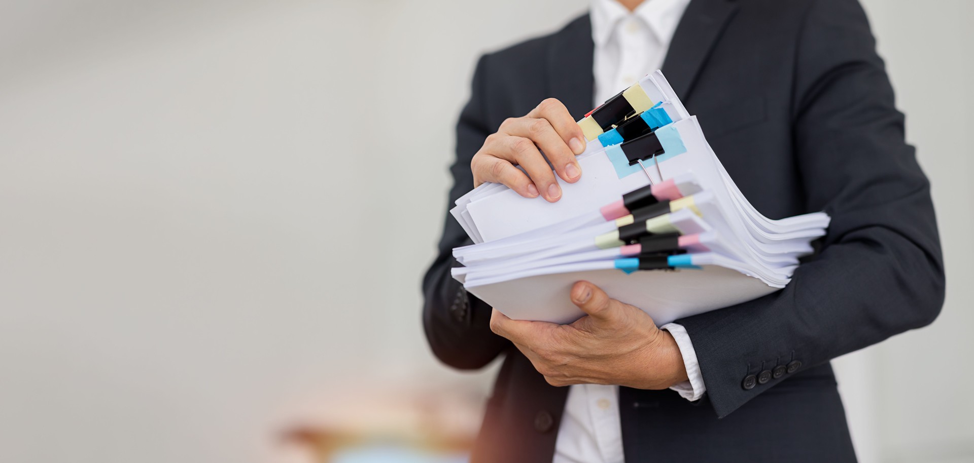 Business accountant document legal, Auditor businesswoman Office employee working with documents at the table workplace, closeup
